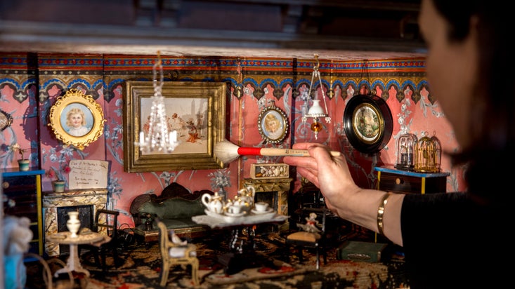 Conservator restoring Beatrix Potter’s Doll’s House at Hill Top, Cumbria, including items that appear in Beatrix Potter's The Tale of Two Bad Mice